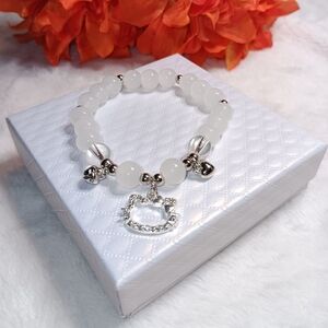 Elegant White Beaded Bracelet with Silver Hello Kitty Accents